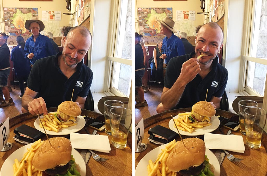 Eating a burger at the Marree Hotel, South Australia