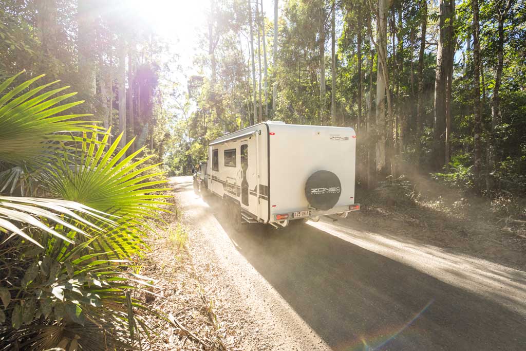 towing a caravan through the rainforest